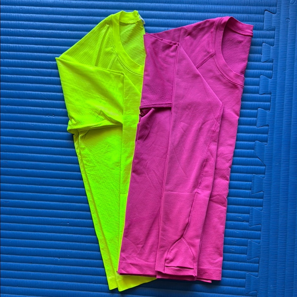 Lululemon Swiftly long sleeve race length shirts.  Vibrant Neon Yellow and Pink
